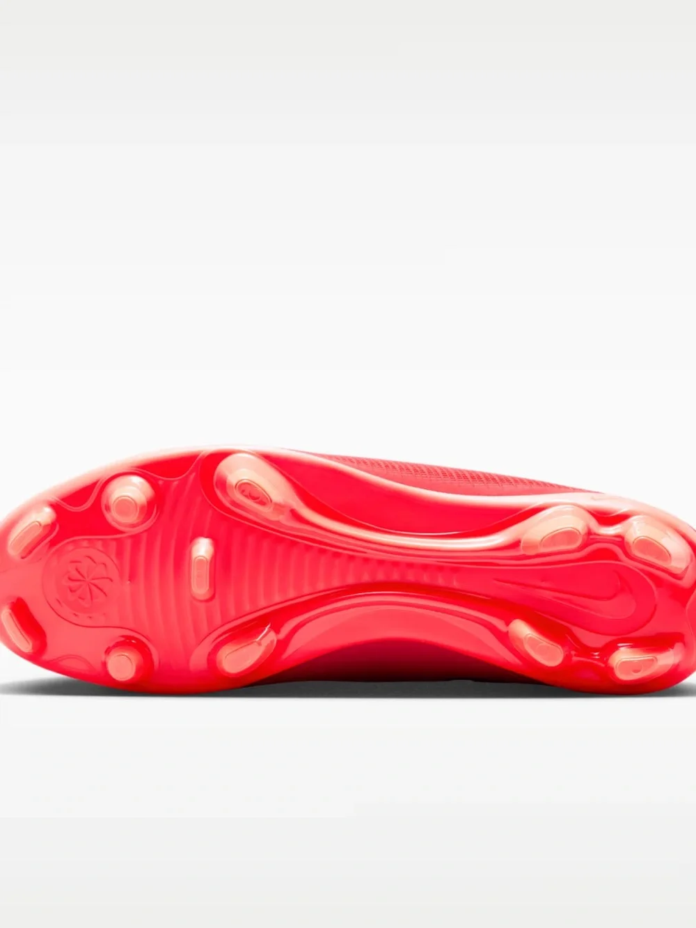 Nike Women’s Red Soccer Cleats with Gold Swoosh Accent
